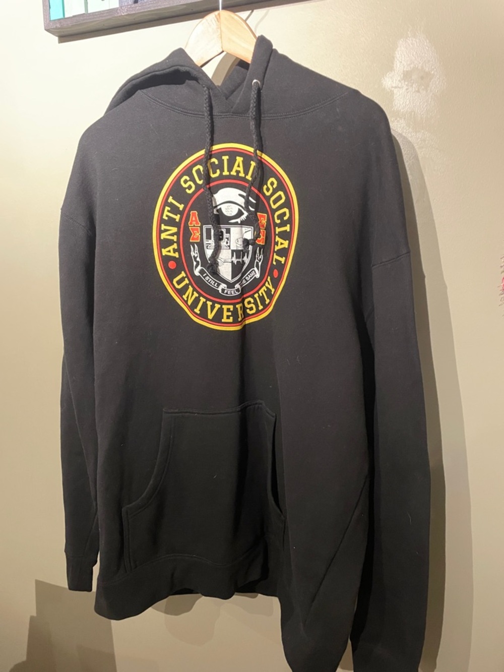 Anti Social Social Club Black Hoodie with Red and Yellow University Crest